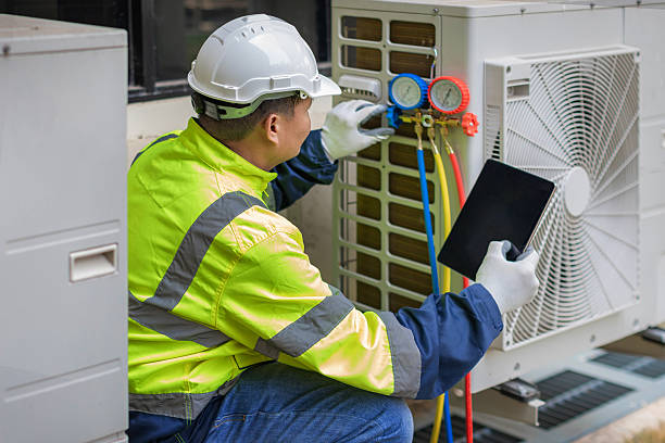 Professional Heat Pump Repair technician working in Newtonville, NY